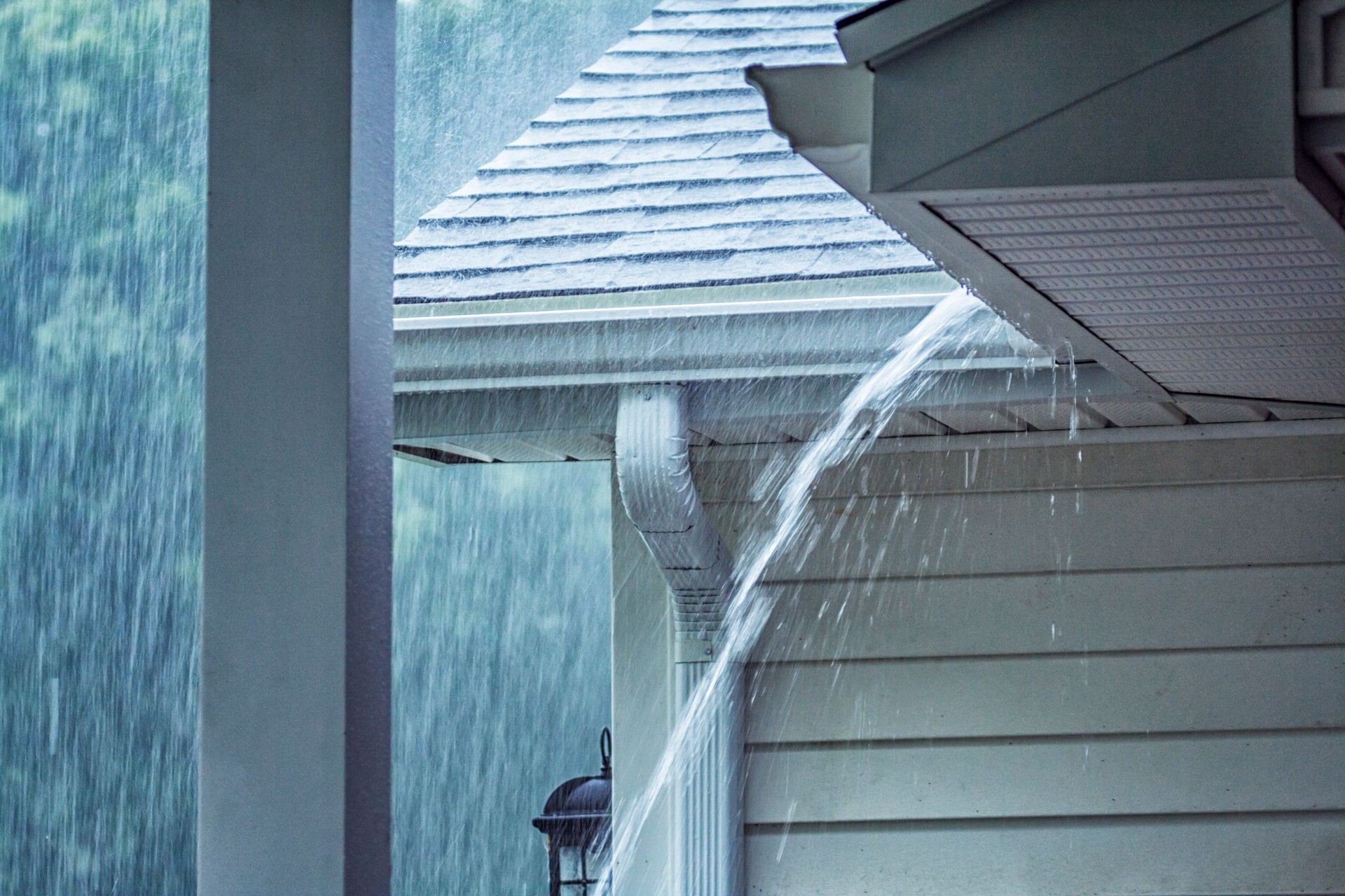 Drenching Rain Storm Water Overflowing Roof Gutter